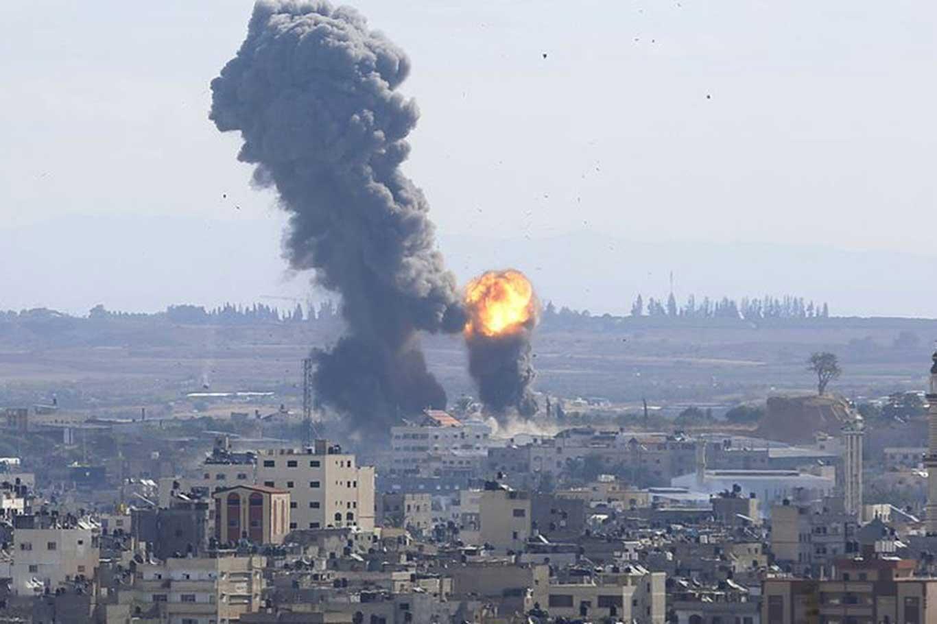 Zionist regime's airstrikes target different areas of Gaza